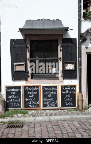 Menu boards outside a restaurant serving traditional Bavarian food, Freiburg im Breisgau, Baden Württemberg, Germany Stock Photo