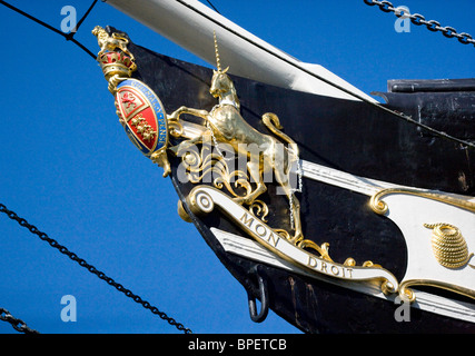 Prow of Brunel's liner SS Great Britain with unicorn and royal coat of arms in dry dock by the floating harbour at Bristol UK Stock Photo