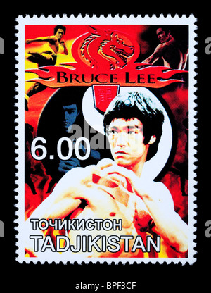 TADJIKISTAN - CIRCA 2000: A postage stamp printed in Tadjikistan showing Bruce Lee, circa 2000 Stock Photo