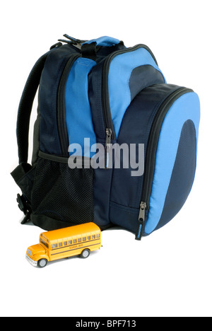 Blue Backpack With Model Die-cast Yellow School Bus, Isolated On A White Background Stock Photo