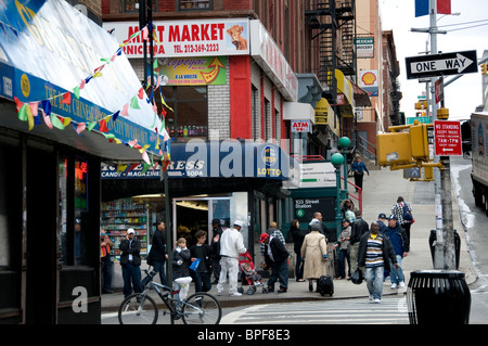 East Harlem street corner with local people of the community Stock Photo