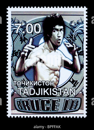 TADJIKISTAN - CIRCA 2000: A postage stamp printed in Tadjikistan showing Bruce Lee, circa 2000 Stock Photo