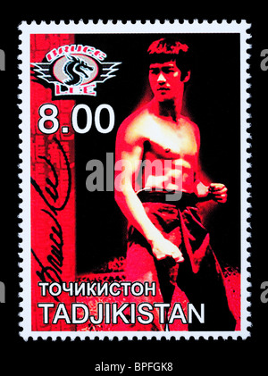 TADJIKISTAN - CIRCA 2000: A postage stamp printed in Tadjikistan showing Bruce Lee, circa 2000 Stock Photo