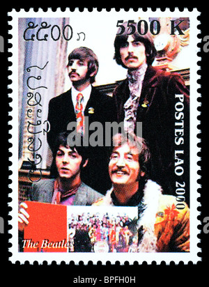 LAOS - CIRCA 2000: A postage stamp printed in Laos showing The Beatles, circa 2000 Stock Photo