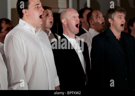 Male voice choir rehearsing at the National Eisteddfod of Wales, Ebbw Vale 2010 Stock Photo