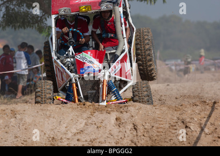 Off-road dune buggy competing in the mud Stock Photo