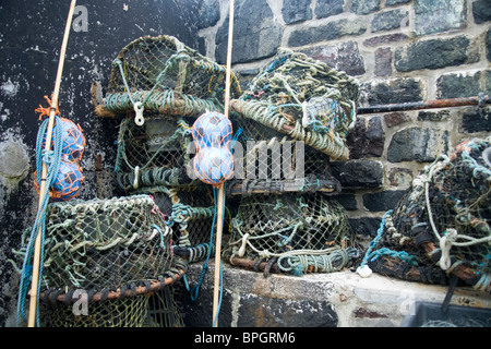 Fishing for lobster at Mullion Cove Stock Photo