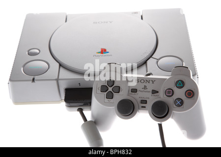 original playstation psone console and dual shock controller from the 90s retro gaming old historic games machine Stock Photo