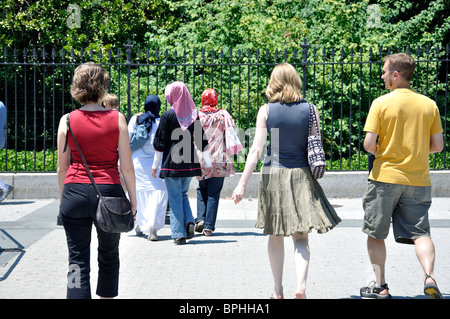 Muslim women walking near by the White House, Washington DC, USA Stock Photo