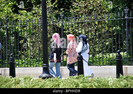 Muslim women walking near by the White House, Washington DC, USA Stock Photo