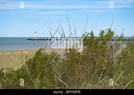 Distant blurred view of North Pierhead Light house lighthouse in Manistee on Lake Michigan in USA low angle nobody hi-res Stock Photo