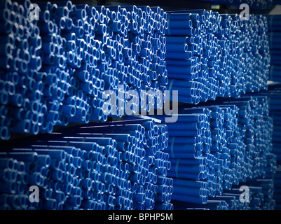 Blue Plastic Pipes Tubes In Manufacturing Facility, Pittsburgh, USA Stock Photo