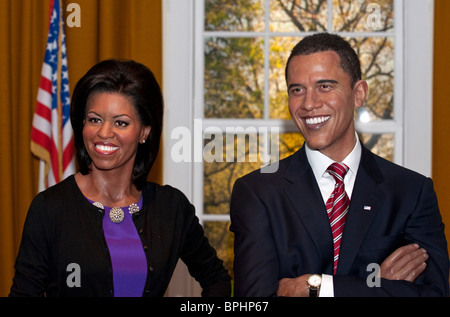 Michelle and Barack Obama 's wax figures in a recreation of the Oval Office at Madam Tussauds London UK Stock Photo