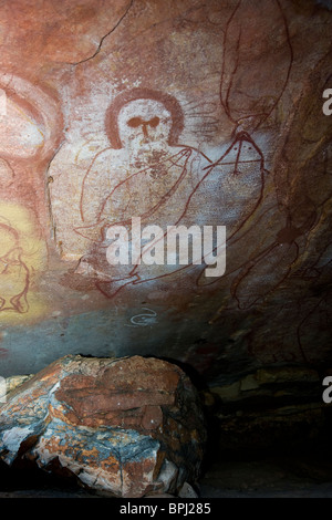 Wandjina figures created by the Worrorra people on a cave ceiling at Raft Point in Collier Bay Australia Stock Photo