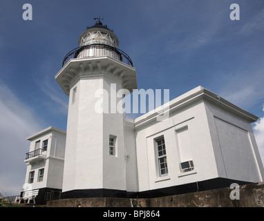 The historic lighthouse on Cijin Island at the entrance to Kaohsiung Harbor in Taiwan Stock Photo