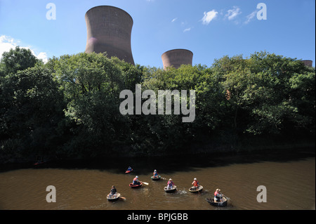 River Severn, Ironbridge Coracle Regatta with the Power Station in the background, Shropshire, August 2010 Stock Photo