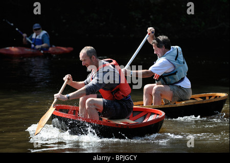 Race on the River Severn, Ironbridge Coracle Regatta, Shropshire, August 2010 Stock Photo