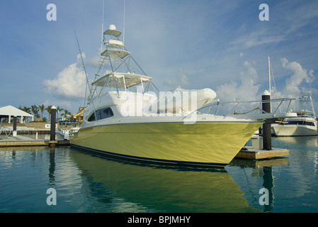 sport fishing boat reflected in water Stock Photo
