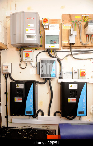 Domestic wind turbine isolator grid inverters and control boxes UK Stock Photo