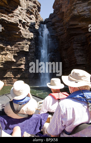 Passengers from Aussie expedition cruiser Orion enjoy a Zodiac excusion on King George River to the base of King George Falls Stock Photo