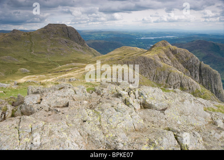 The Langdale Pikes of Loft Crag and Harrison Stickle, from Pike O'Stickle, with Windermere beyond.