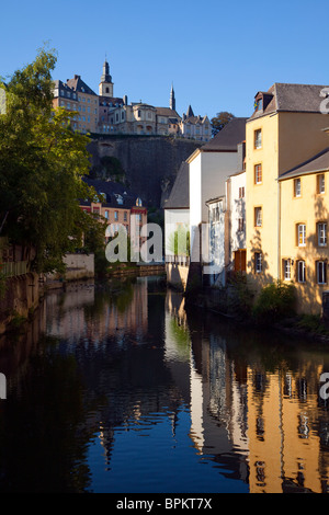 Houses on the Alzette river at Grund, quarter, Luxembourg, view to the town above Passerelle wall Stock Photo