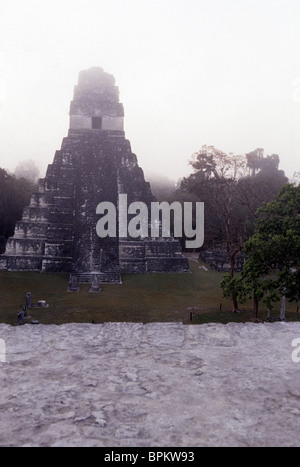 Sunrise over Mayan ruins of Temple I in the Great Plaza of UNESCO World Heritage site of Tikal- Tikal National Park, Guatemala. Stock Photo