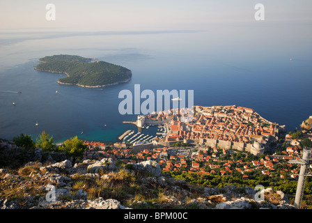 DUBROVNIK, CROATIA. An early morning view of the old town and Lokrum island nature reserve from the summit of Mount Srd. 2010. Stock Photo