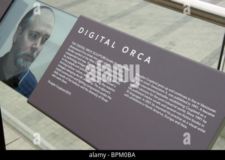 Information about the Digital Orca sculpture by Douglas Coupland at the Convention Centre in Vancouver, British Columbia, Canada Stock Photo