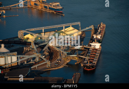 Sulfur Terminal,North Vancouver, Vancouver Harbour,cargo ship Hong Dai,British Columbia, Canada Aerial Stock Photo