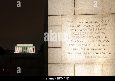 WASHINGTON DC, USA - Lincoln Memorial in the distance, with a quote from President Harry S Truman etched in stone in the foreground at the National World War II Memorial Stock Photo