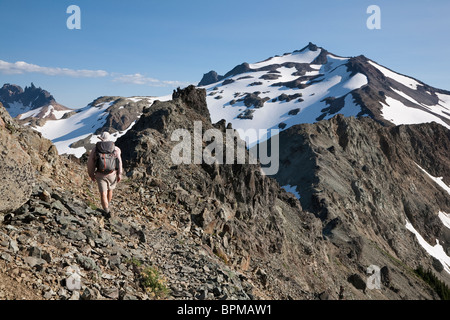 Dayhiker on the Pacific Crest Trail looking south towards Old Snowy Mountain - Goat Rocks Wilderness Stock Photo