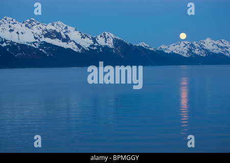 Full moon over Resurrection Bay, Seward, Alaska. Stock Photo
