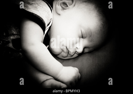 Baby boy sleeping peacefully. Stock Photo