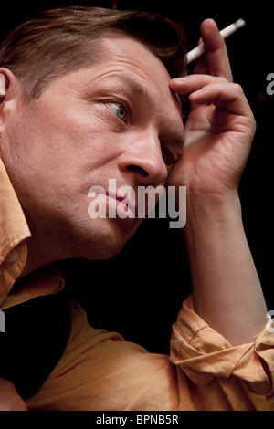 People in club and smoking a cigarette in the toilet and have lots of fun  Stock Photo