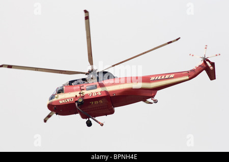 Water Dropping Helicopter Stock Photo