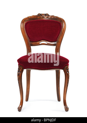 Antique wooden chair with red upholstery isolated on white background Stock Photo