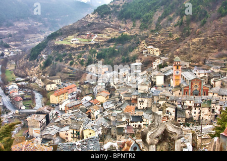 View over Tende in the French Maritime Alps, from the cemetery above the town with Notre Dame de l'Assomption collegiate church. Stock Photo