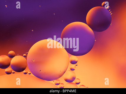 Orange and purple bokeh abstract background color from oil and water Stock Photo