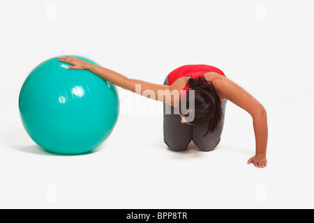 Woman, callistenic stability ball / callistenics Stock Photo