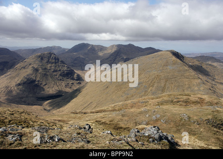 Looking back towards the Graham of Croit Bheinn and the Corbett of Beinn Mhic Cedidh from the slopes of Beinn Odhar Bheag. Stock Photo