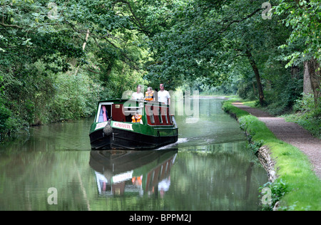 A narrowboat on the Oxford Canal near Brinklow, Warwickshire. Stock Photo