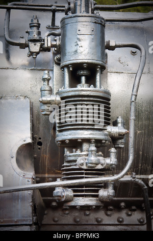 Detail of the engine of a steam train locomotive at Resita Train Museum in Romania. Stock Photo