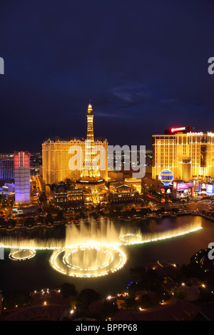 View of the Bellagio fountain and Paris hotel at night, Las Vegas Stock Photo