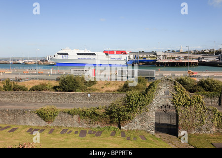 Holyhead, Isle of Anglesey, North Wales, UK. HSS StenaLine ferry in port from churchyard of Saint Cybi in Caer Gybi Roman Fort. Stock Photo