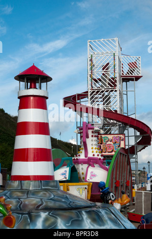Helter skelter and Fairground rides at Cromer seafront in Norfolk East Anglia England Stock Photo