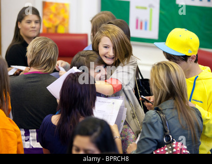 Pupils at Perry Beeches school in Birmingham celebrate their GCSE exam results. Stock Photo