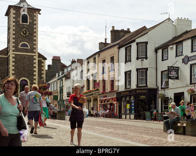 People tourists visitors at The Moot Hall Market Square in summer Keswick Cumbria England UK United Kingdom Great Britain GB Stock Photo
