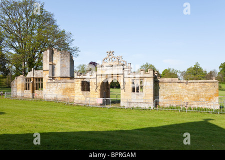The ruins of the Jacobean gatehouse of the Old Manor west of church of St Andrew in the village of Toddington, Gloucestershire. Stock Photo