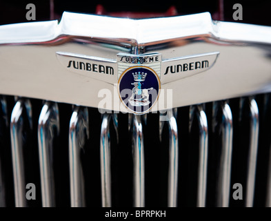 Chrome plated radiator vents and company logo on the front of a Sunbeam Supreme motor car Stock Photo